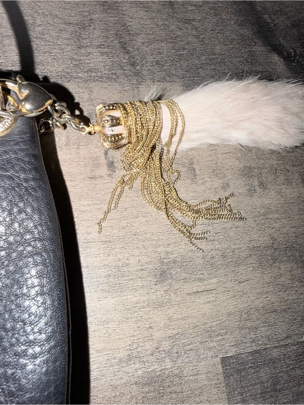 Vintage Juicy Couture Black Pebbled Leather Shoulder Bag with rabbit foot Tassel